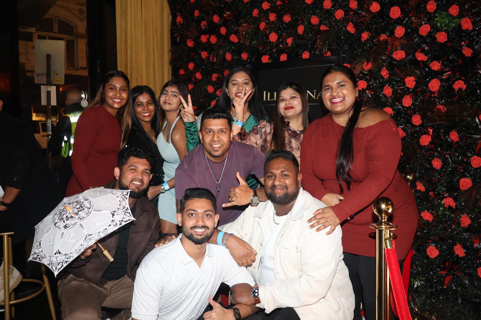 A group celebration at the Illumina photo wall